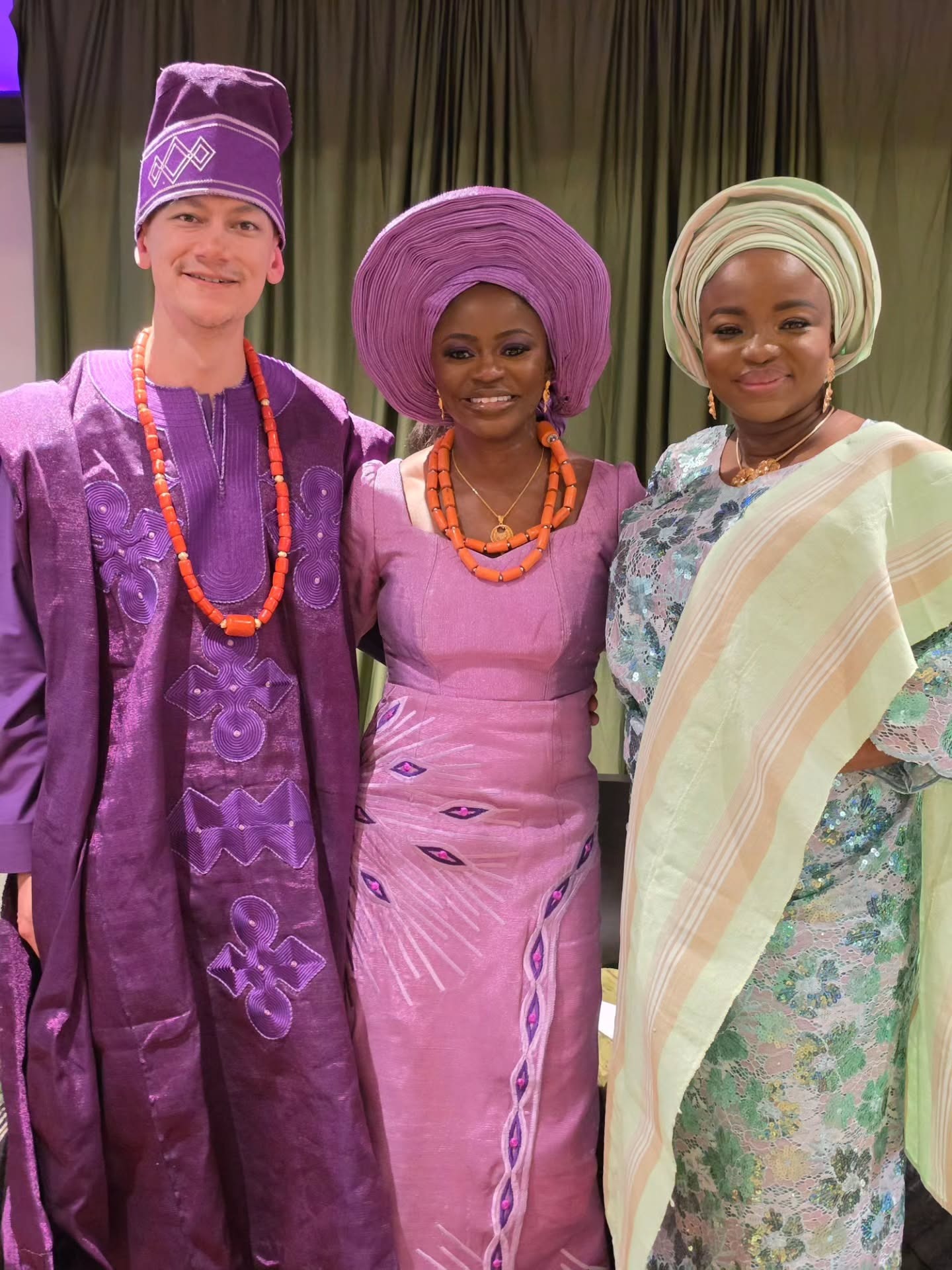 Three women in colorful attire